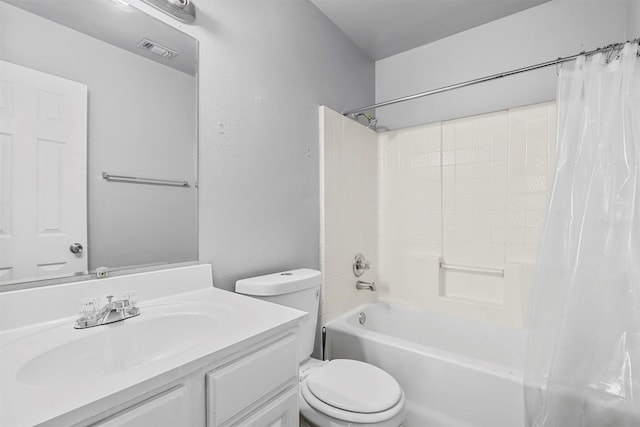 bathroom featuring shower / bath combo, visible vents, vanity, and toilet