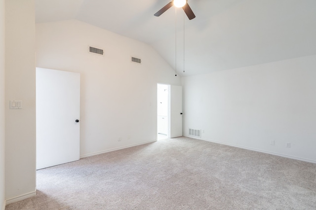 empty room featuring visible vents and light colored carpet