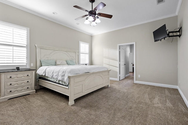 bedroom featuring carpet floors, baseboards, visible vents, and ornamental molding