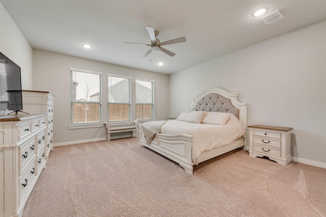 bedroom featuring light carpet, baseboards, visible vents, and recessed lighting