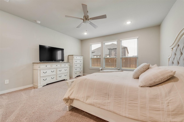 bedroom featuring recessed lighting, light carpet, ceiling fan, and baseboards