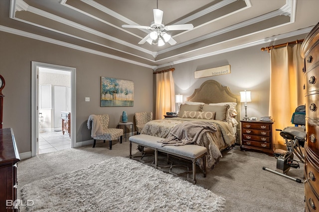 carpeted bedroom with ornamental molding, a raised ceiling, ceiling fan, and baseboards