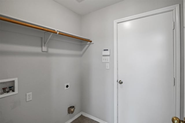 clothes washing area with laundry area, hookup for a washing machine, electric dryer hookup, and baseboards