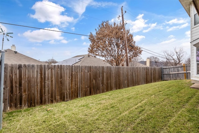 view of yard featuring a fenced backyard