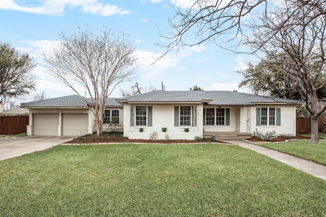 ranch-style house with concrete driveway, an attached garage, and a front lawn