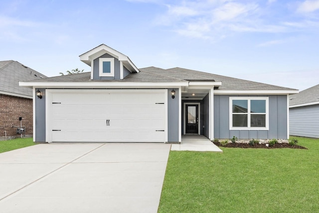 ranch-style home featuring a garage, driveway, board and batten siding, and a front yard