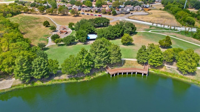 drone / aerial view with a residential view and a water view