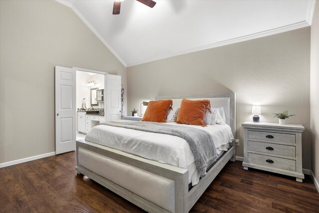 bedroom with dark wood-type flooring, ornamental molding, baseboards, and ensuite bathroom