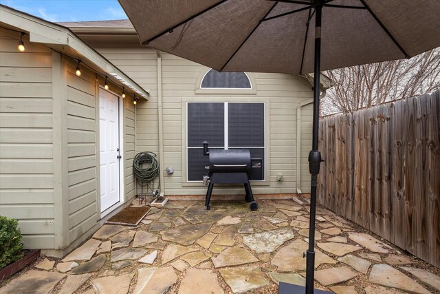 view of patio with fence