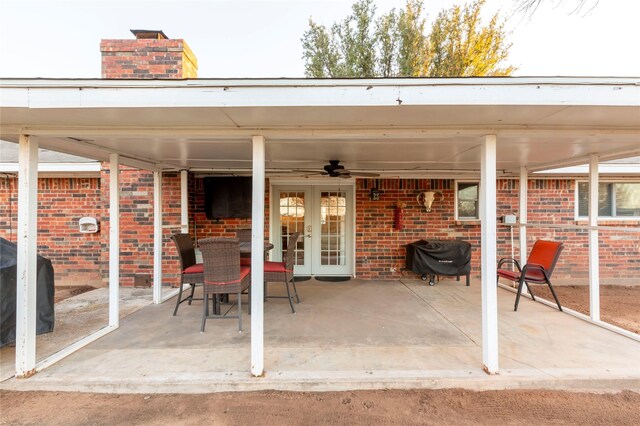 view of patio / terrace with french doors, ceiling fan, and grilling area