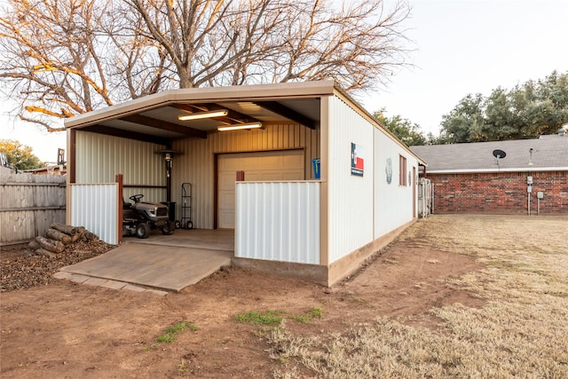 view of outdoor structure with an outdoor structure and fence