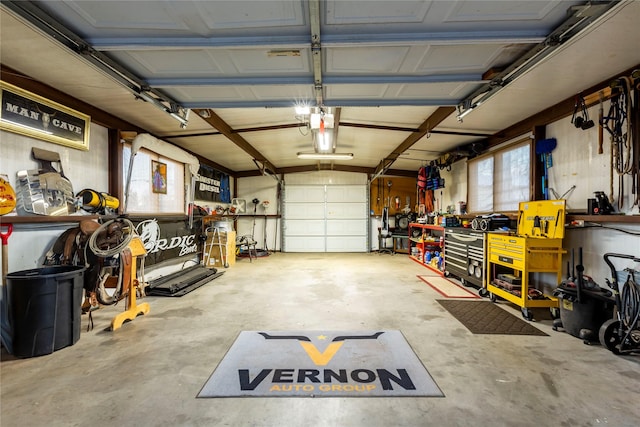 garage featuring a workshop area