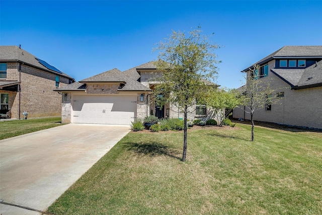 french country inspired facade with an attached garage, stone siding, a front yard, and concrete driveway