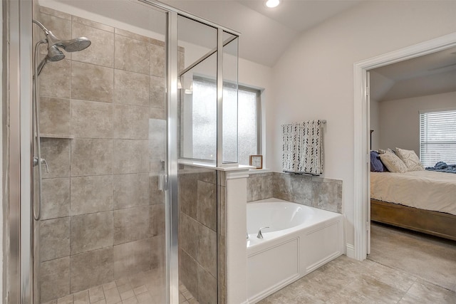 bathroom featuring connected bathroom, lofted ceiling, a shower stall, and a bath