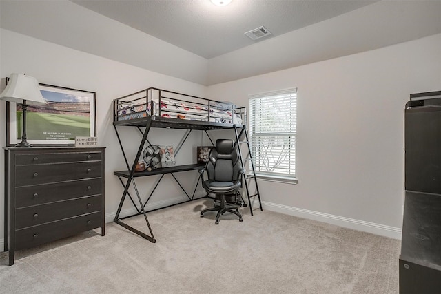bedroom featuring visible vents, carpet flooring, baseboards, and vaulted ceiling