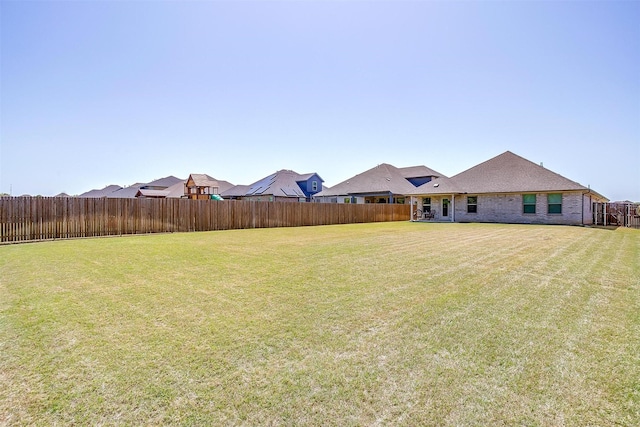 view of yard featuring a fenced backyard