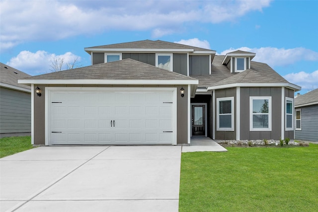 view of front of home with a garage, driveway, a front lawn, and board and batten siding