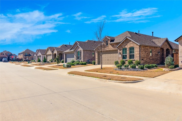 view of front of home featuring a garage, concrete driveway, brick siding, and a residential view