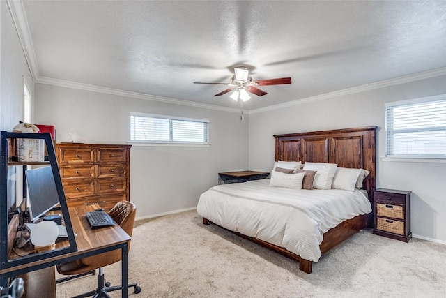 bedroom featuring baseboards, crown molding, and light colored carpet