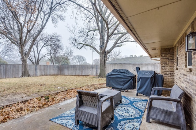 view of patio featuring grilling area and a fenced backyard