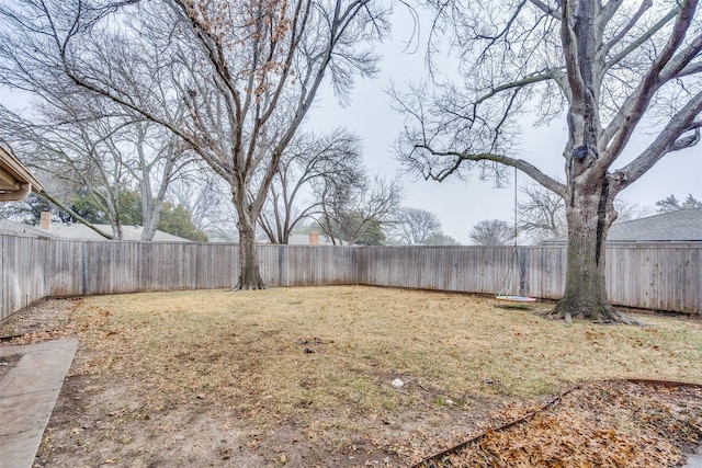 view of yard with a fenced backyard