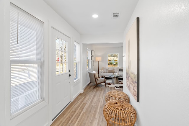 entryway featuring visible vents and light wood finished floors