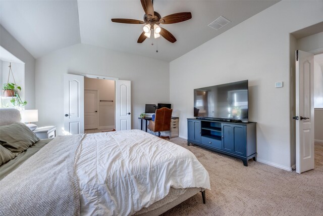 bedroom with lofted ceiling, baseboards, visible vents, and light colored carpet