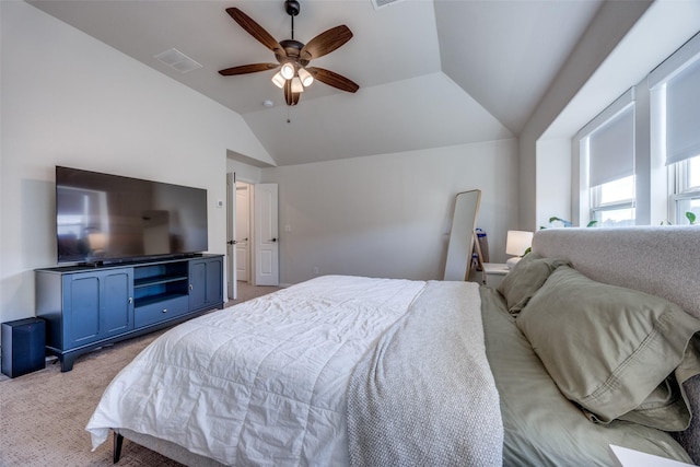 bedroom with light carpet, ceiling fan, visible vents, and vaulted ceiling