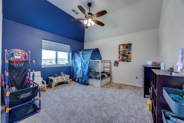 game room featuring visible vents, a ceiling fan, light carpet, vaulted ceiling, and baseboards