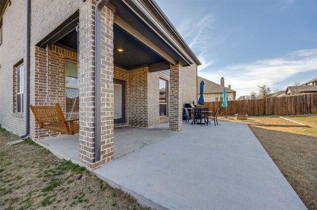 view of patio with fence