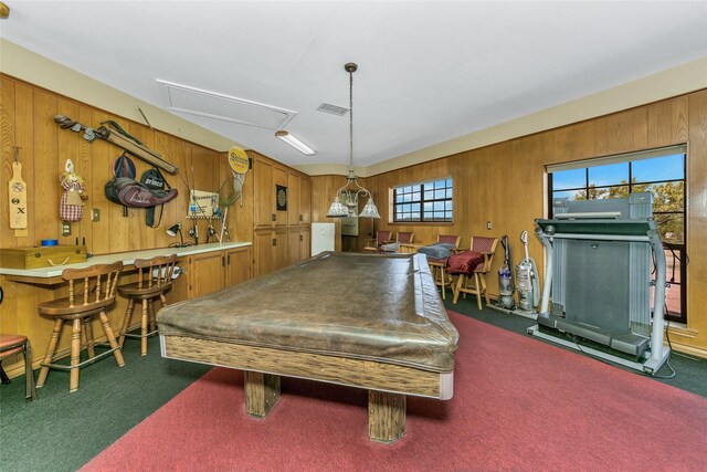 playroom with dark colored carpet and a wealth of natural light