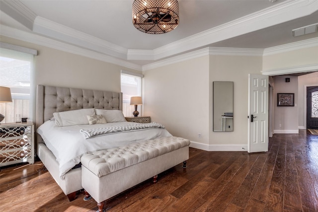 bedroom featuring baseboards, visible vents, dark wood-type flooring, and ornamental molding