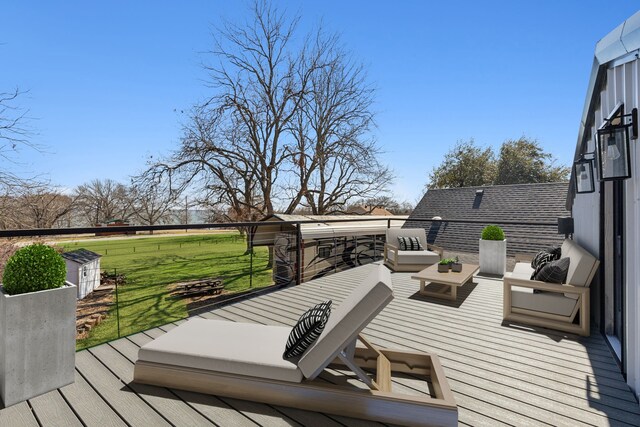 wooden deck featuring an outdoor hangout area