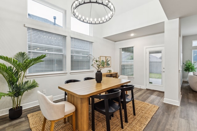 2417 Robin Way, Northlake, TX 76247 - dining space with a chandelier, dark wood finished floors, and baseboards