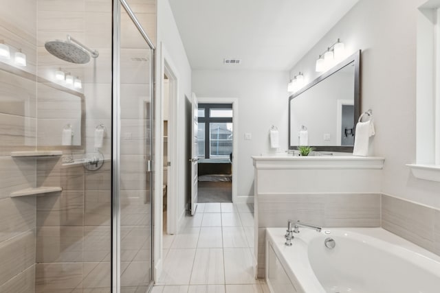 2417 Robin Way, Northlake, TX 76247 - ensuite bathroom featuring a shower stall, a bath, tile patterned floors, and double vanity
