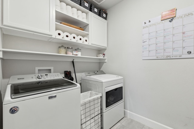 2417 Robin Way, Northlake, TX 76247 - laundry room with cabinet space, washer and dryer, baseboards, and light tile patterned flooring