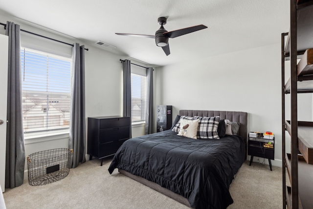 2417 Robin Way, Northlake, TX 76247 - bedroom featuring light carpet and a ceiling fan