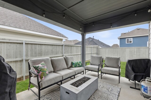 2417 Robin Way, Northlake, TX 76247 - fenced backyard with an outdoor living space with a fire pit, a patio, and grilling area