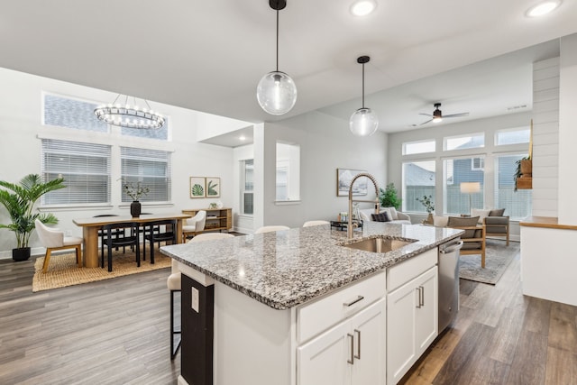 2417 Robin Way, Northlake, TX 76247 - kitchen with a sink, open floor plan, light wood finished floors, a ceiling fan, and recessed lighting