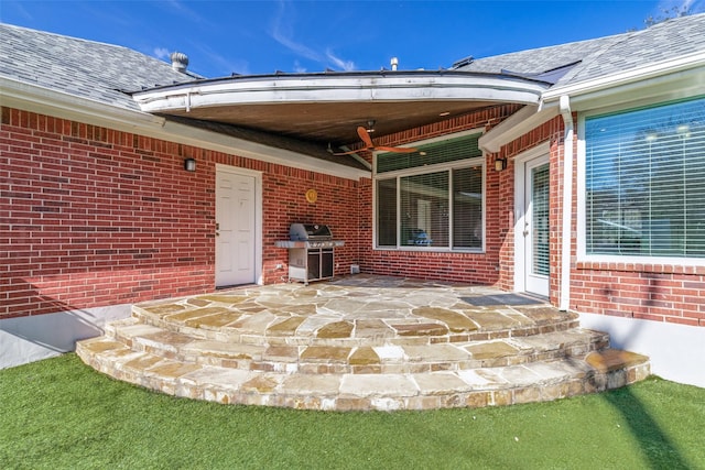 view of patio featuring a grill and a carport