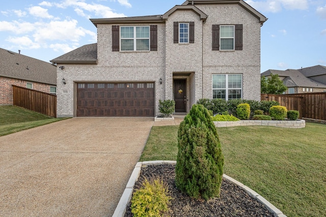 traditional-style home with fence, a front lawn, and brick siding