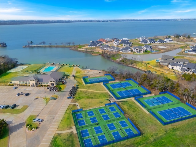 bird's eye view featuring a residential view and a water view