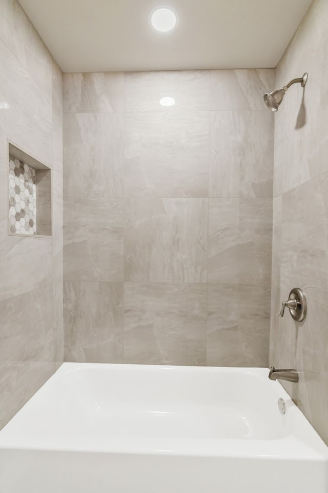 full bathroom featuring  shower combination