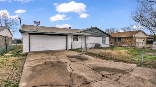 single story home with an attached garage, fence private yard, brick siding, driveway, and a front lawn