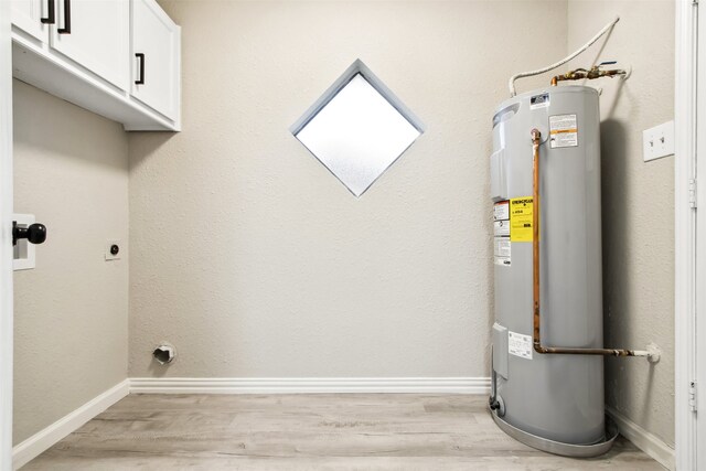 utility room with water heater