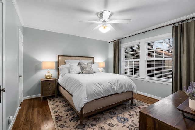 bedroom with baseboards, ornamental molding, and dark wood-type flooring