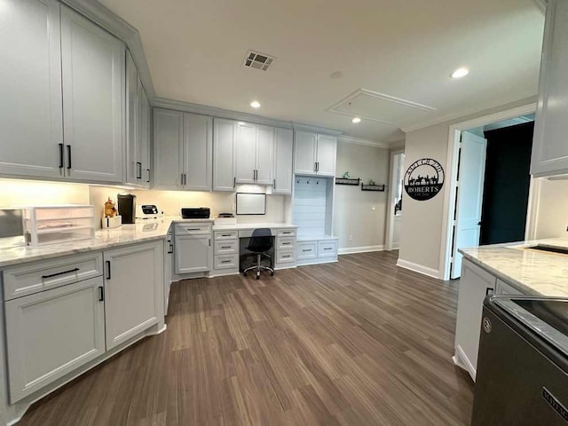 kitchen with visible vents, light stone countertops, baseboards, recessed lighting, and dark wood-type flooring