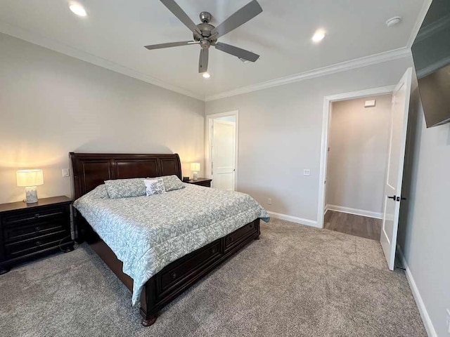 carpeted bedroom featuring recessed lighting, ornamental molding, baseboards, and a ceiling fan