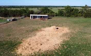 view of yard featuring a carport and a rural view
