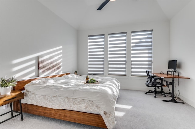 bedroom featuring carpet floors, lofted ceiling, ceiling fan, and baseboards